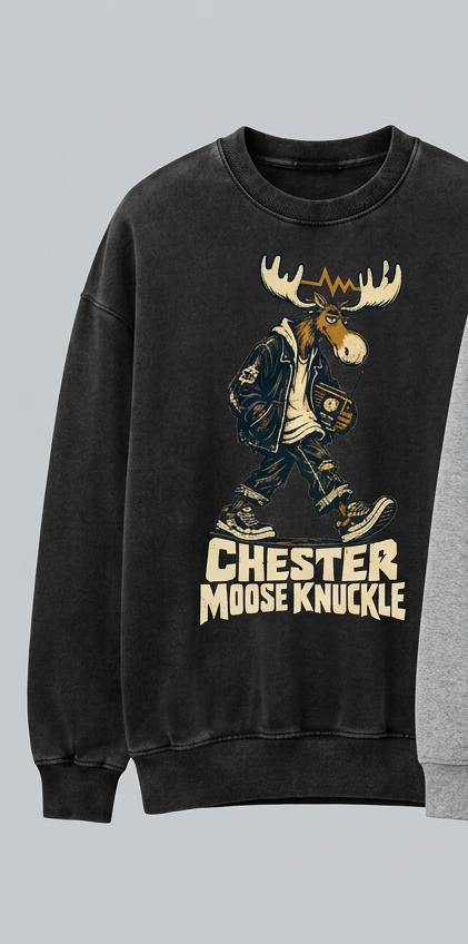 Washed-black crewneck sweatshirt, front view, with cream-and-brass Night Shift Chester in an oversized jacket carrying a radio above the brand name; design mockup.