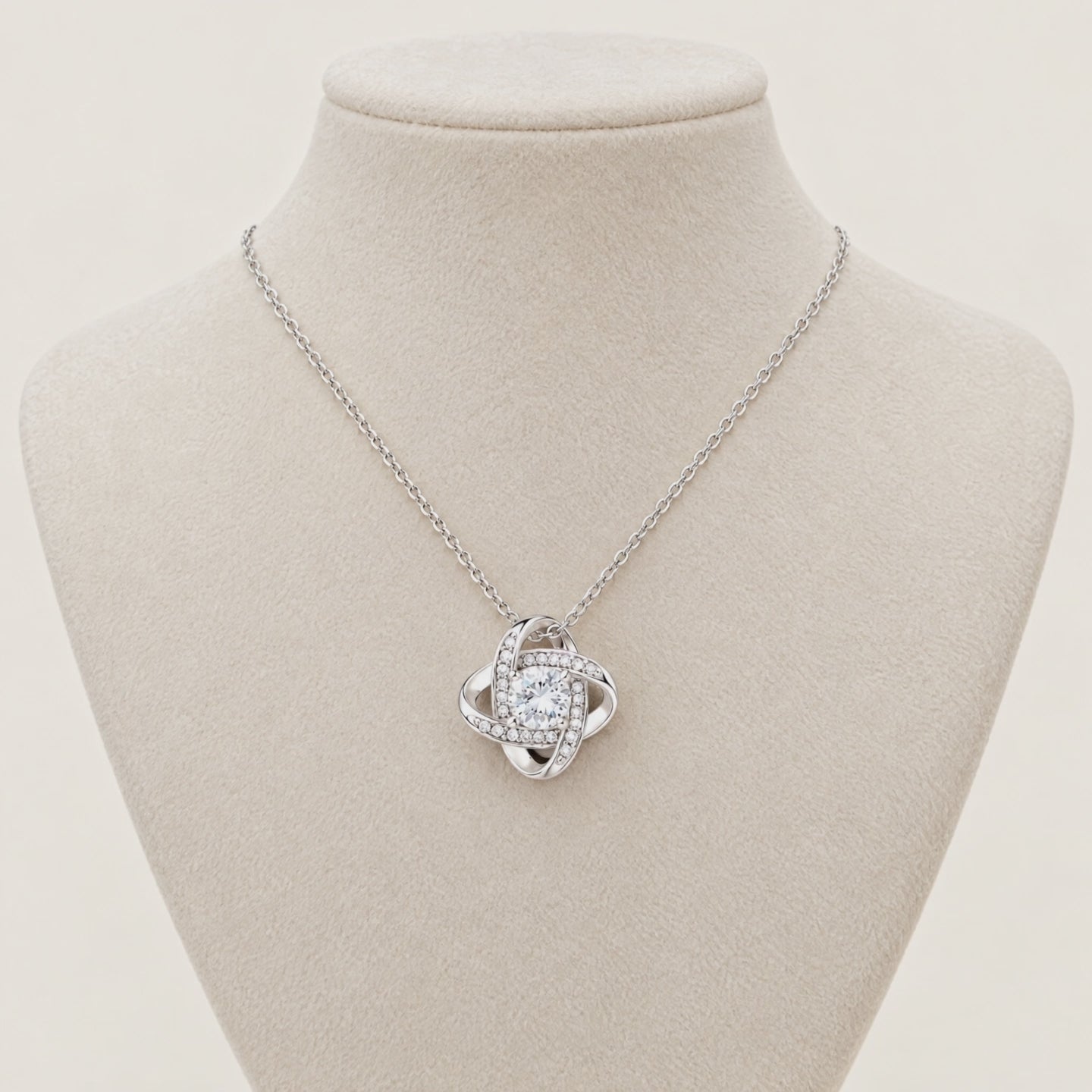 360 view of the Love Knot necklace on a display bust
